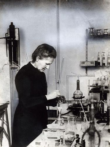 Marie Curie and Po Polonium was discovered by Marie Curie in the act of processing huge amounts of Uranium ore and following its separation by radioactivity.