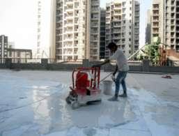 GRINDING OF KOTA STONE AT PODIUM PAINTING IN