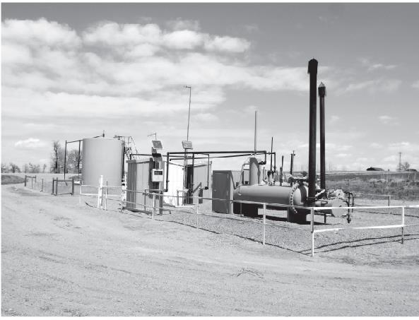 Gas wells with condensate tank