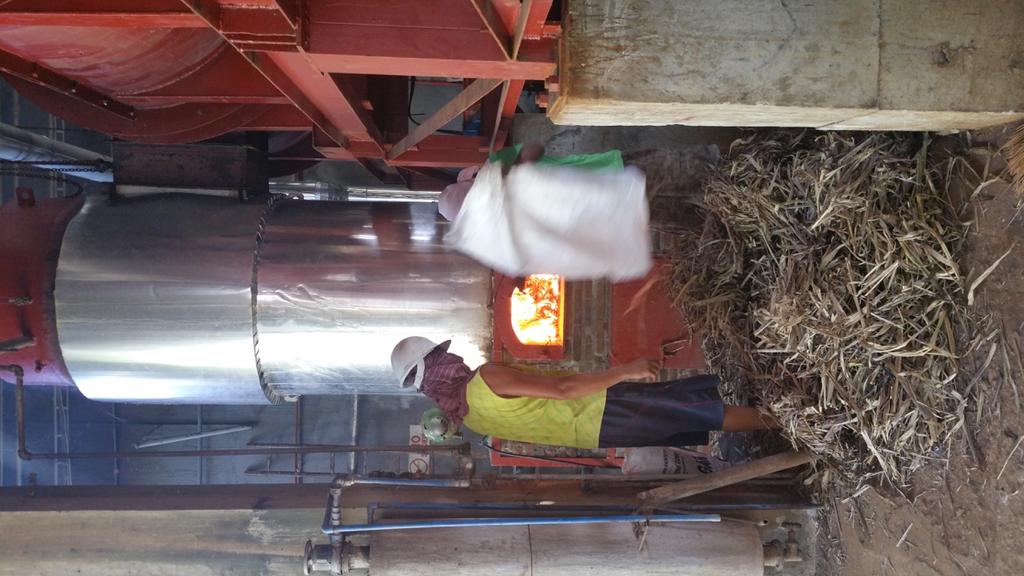 It was designed to torrefy dried sugar cane bagasse by conduction heating in a rotating cylinder using chopped sugar cane trash as fuel for the furnace.