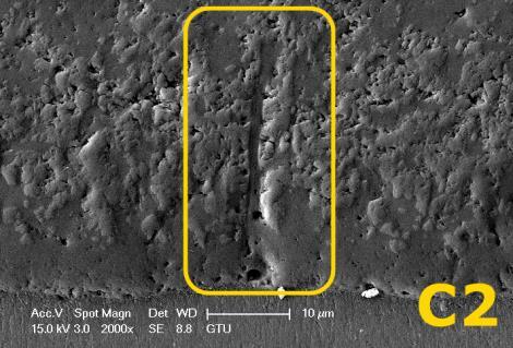 Fig. 6: An SEM micrograph of the sample C2 (discharge hole). Cross sectional SEM images of C1, C2, C3, C4 and C5 were given in Fig.