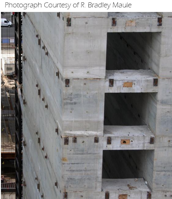 B.2.2 FRAMING AND FLOOR SYSTEM The steel beams frame into the concrete core at embedded plates. The embedded plates are visible in Figure B-6 below.
