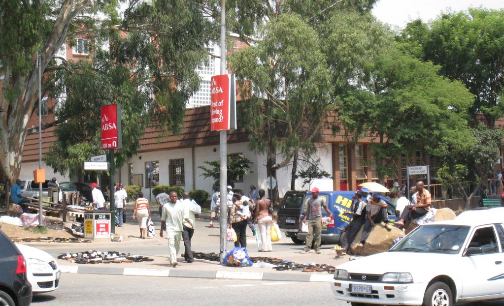 Active street life along Old Pretoria Main Road within the