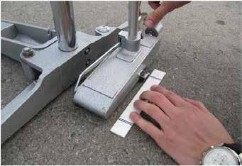 The test is performed according standard EN 364 Road and airfield surface characteristics Test methods Part 4: Method for measurement of slip/skid resistance of a surface: The pendulum test.