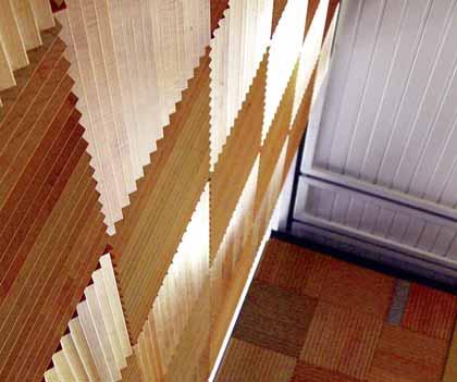 Ribbed wall carpeting. Wood veneers. Plastic laminates.