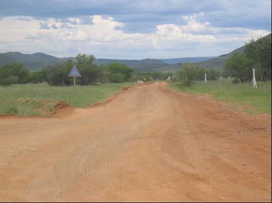Photograph 5: Indicates the road leading