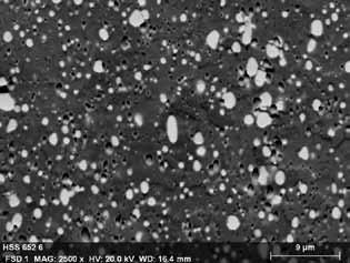 Center: Backscattered electron image of a high speed steel, showing matrix and precipitates. The precipitates appear bright due to their higher density.