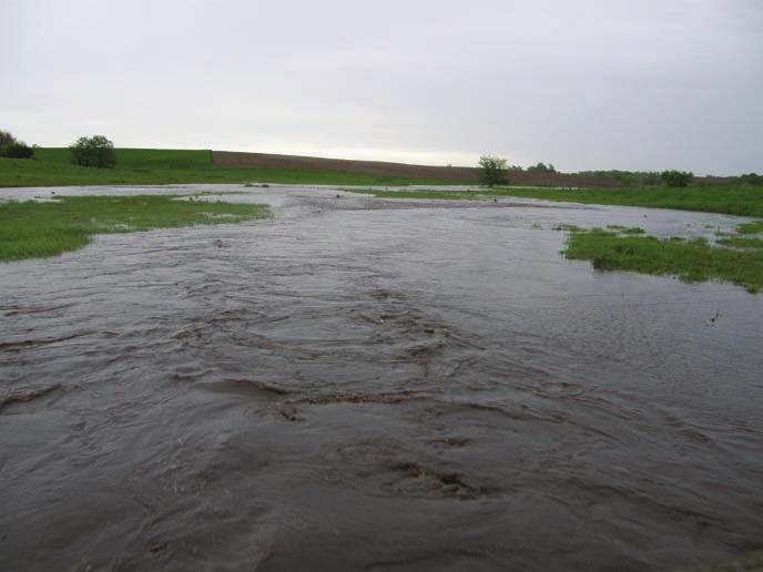 From May 30, 2008, to June 12, 2008, the previously saturated soils could not retain any more rainfall, and the wetlands, potholes, and depressions in the upland landscape filled with water (figure