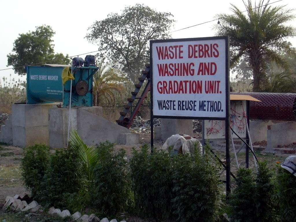 Debris and inert materials are washed and graded by
