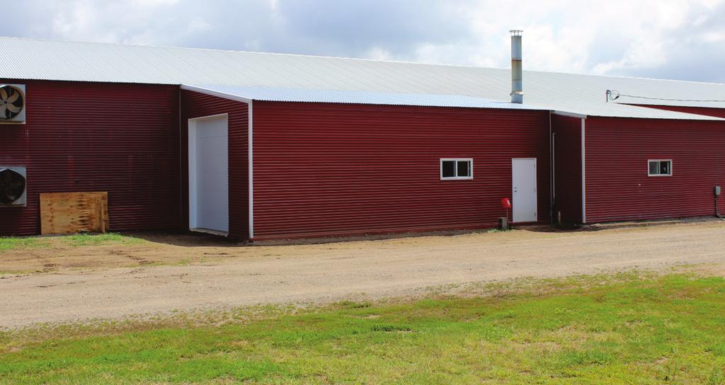 Two-story broiler chicken barn.
