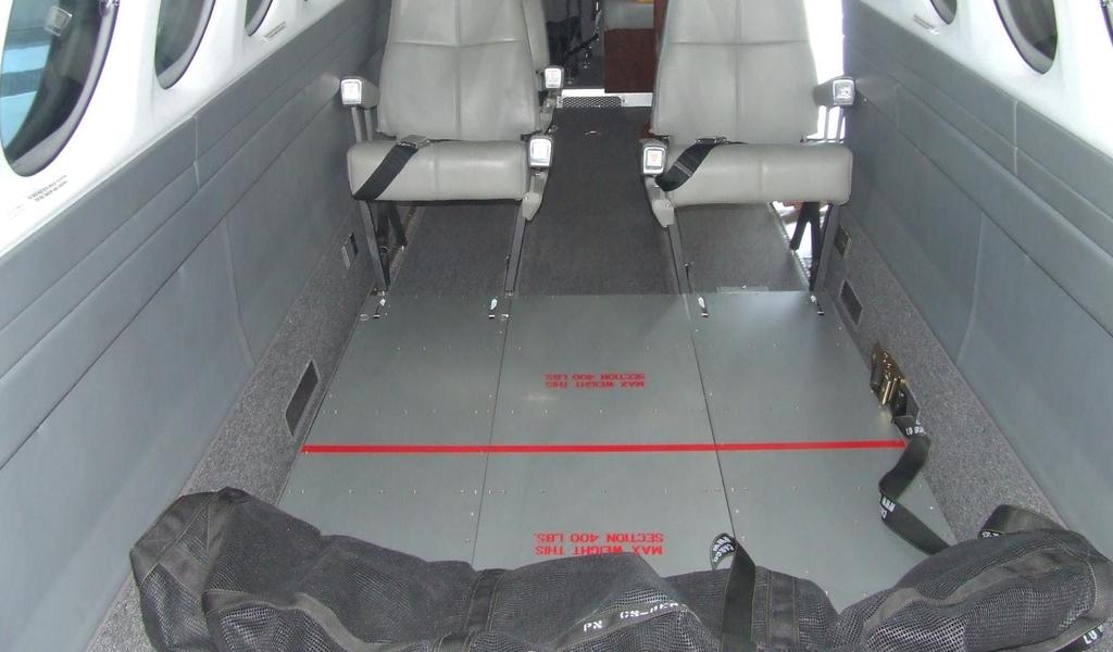 Configuration F is shown in the King Air 200 series. This configuration will allow for up to 800 pounds of freight and still have seating for 5 passengers.
