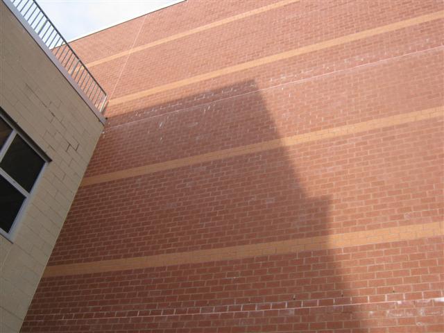 Even though weep holes were installed as part of the wall construction, the efflorescence indicates water is accumulating in the cavity.