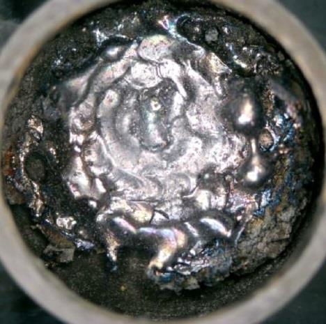 2 that the formation of the melt of hafnium carbide starts at first in the mechanocomposite, and later in hafnium carbide powder.