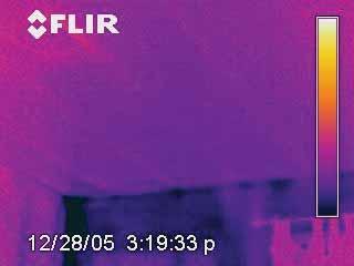 This thermal bypass is evident in the infrared image in Figure 2.6.2. Here, you can see how missing air barriers can lead to cold surface areas in walls adjoining a porch roof.
