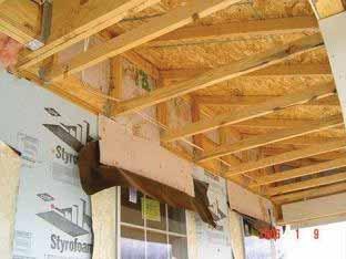 Once the blocking is installed, the area can be easily insulated much like a band joist (flat porch roof) or attic knee wall (sloped porch roof).
