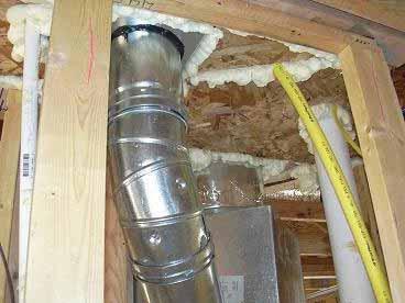4.1 DUCT SHAFT Figure 4.1.4 shows a duct shaft with blocking and sealing that effectively accommodates a flue, piping and