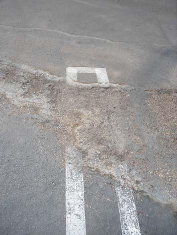 13. Do you see cracks in the pavement, uneven sidewalks where water runs off or other water damage in the pavement or parking lots? If yes, describe the location and what you see.