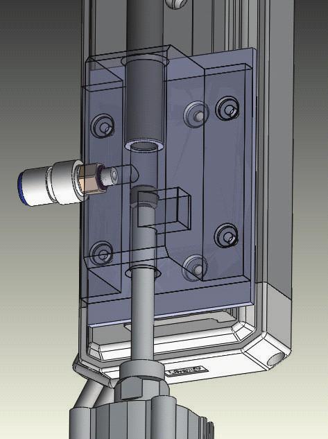 When empty cartridge is automatically delivered to this subsection, the linear actuator drives subassembly section downward until it contacts the cartridge top surface.