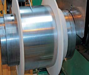 OSCILLATED WOUND REELS 12 PRODUCTION AND SPECIAL ORDER WORK All metals and alloys Strips from 3 mm to 50 mm wide and from 0,1 mm to 2,5 mm thick Welds marked by no increase in