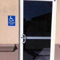 Accessible parking spaces required by Section 1106.2.