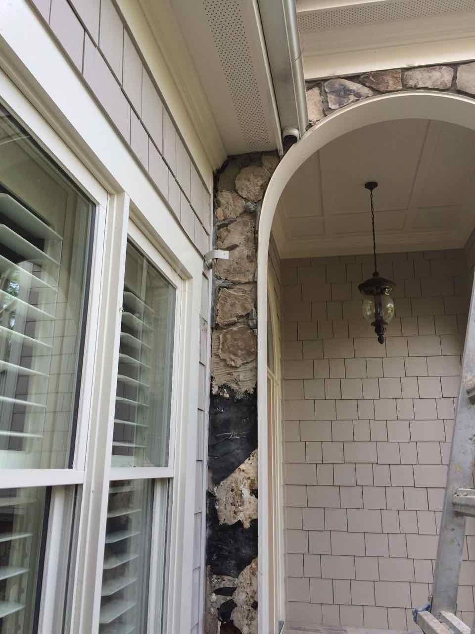 Wall. Stone Runs To Roofing Damage