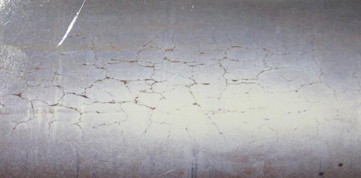 0 mm thick wall of specimens, cracks reached a length between 300 µm and 1 500 µm (Figure 7).