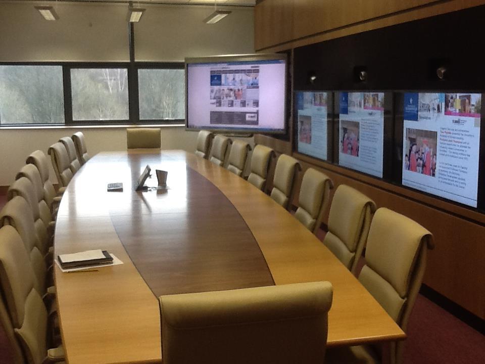 The main room needed to support video conferencing and an additional presentation screen and offer enough
