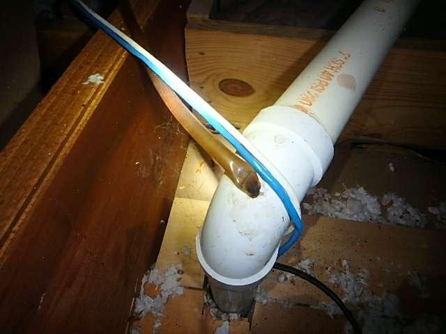 The tube is kinked where connected into the vent pipe, which raises