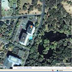 length from aerial view = 30 m Estimated width from aerial view =