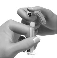 Keep the cover on. Press the needle onto the syringe. Turn it clockwise until it locks into place. Tip: Make sure the injection needle is firmly attached to the syringe.
