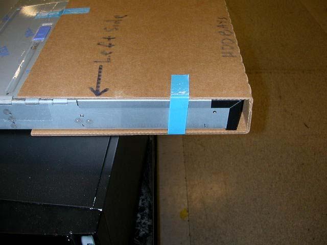 Wrap piece of tape goes around the left side of the system and loadspreader, and place one piece of tape at the top of