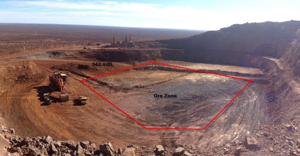 Figure 3: Mining in the T1 open pit in March 2014, with the ore zone shown in red. Production and shipping statistics for Tallering Peak are tabulated in Appendix A.