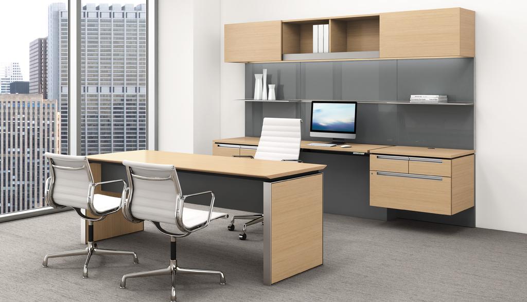 A signature Alto storage wall offers a choice of suspended cabinets and a height- adjustable center worksurface
