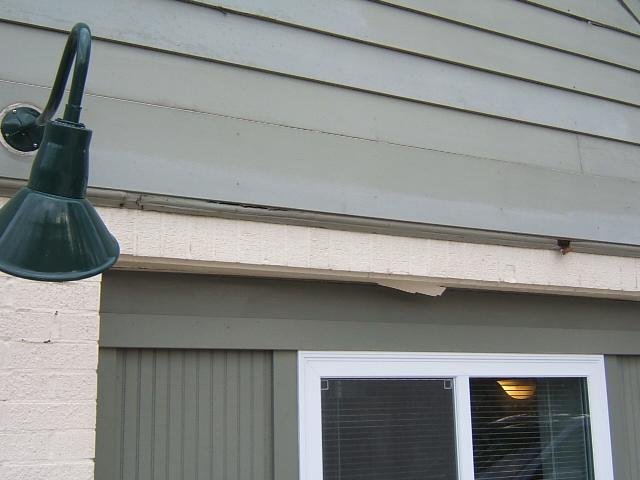 Replace the rotted boards here and add a Z flashing on the skyward facing surface of this horizontal trim surface D).
