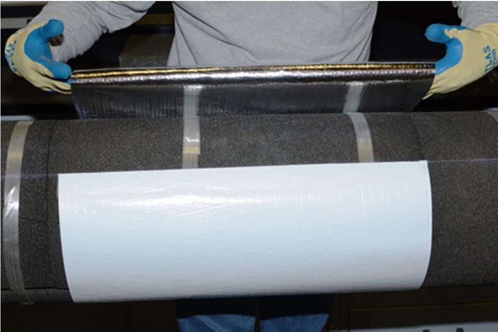 Wrap the jacketing around the pipe insulation keeping tension on the