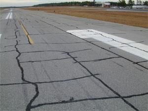 Cracking - Block Possible Causes Shrinking and hardening of the asphalt over time As the
