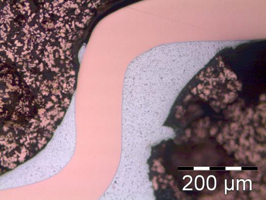 Figure 13 - Cross section of an as-reflowed LF-component soldered using LF-paste (optical microscope image).