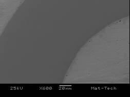 intermetallics. The intermetallic layer thickness, evaluated from secondary electron images, is aout two micrometers.