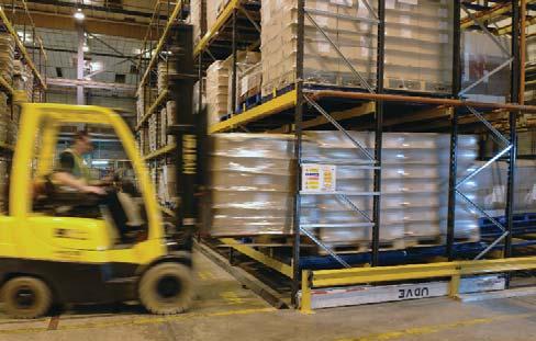 Carts interlock to prevent jamming and to control pallet descent.