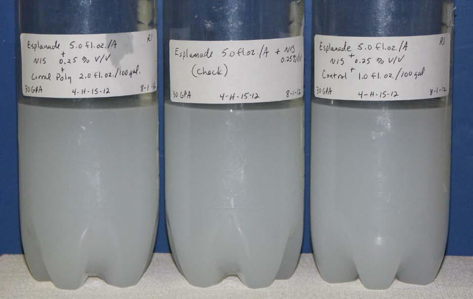 Figure 1. Compatible mixture of Esplanade 200 SC and Corral Poly (bottle on far left) and Control mixture in the far right bottle.