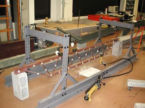 Figure 6 - New rig for testing of steel elements with truss in preparation for testing. Post-tensioned Concrete Beam.