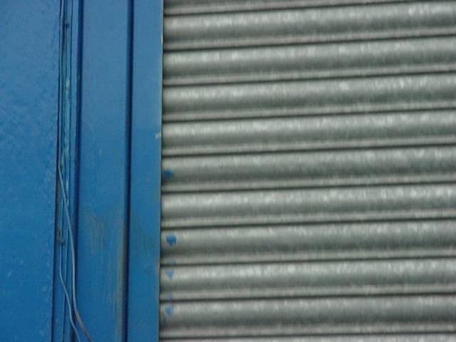 timber cill Marked front door Blue paint marks Timber cill needs