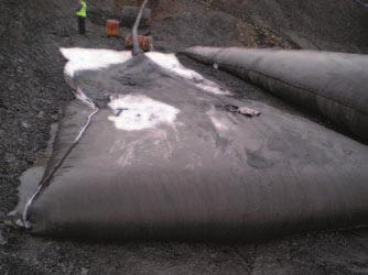 5. DEWATERING dewatering and containment of mining waste requires a special solution of its own.