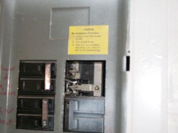 Electrical 1. Service Entrance Conductor Condition Materials: Above Ground 2. Main Panel Condition Materials: Garage Materials: 100 There are breaker knock outs missing.