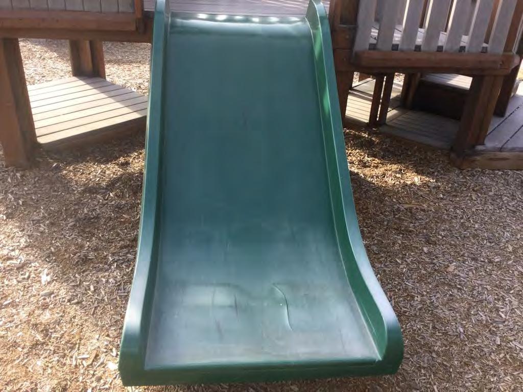Slide 4 Slide name or type Tot wide slide What is the height of the deck from the safety surfacing? 42" Does the slide have any gaps, cracks or entanglements?