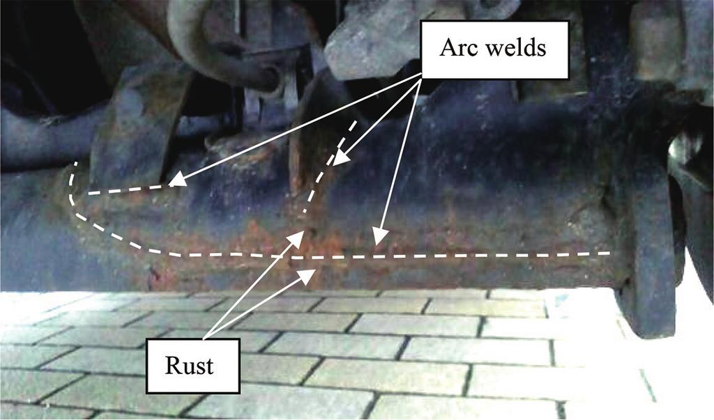 Fig. 1 Example of arc welds in the rear axle of the 13 year-old field tested automobile fects due to slag generated at the time of welding, and the deterioration in coating film adhesion properties