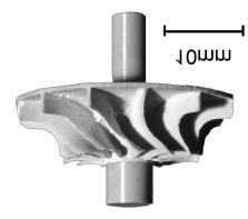 Fig. 1 Silicon nitride turbine engine parts fabricated with Mold SDM: turbine-rotor (Left), inlet nozzle (Right). Fig.