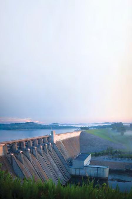 People can even use the water in rivers to produce energy. First, people build a dam. A dam is a large wall in a river that stops the water from flowing. The water gathers into a lake behind the dam.
