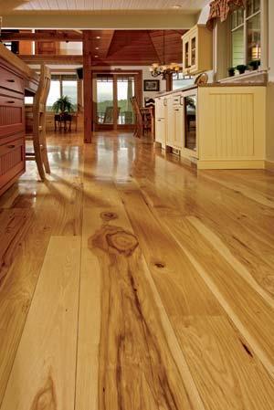 Set door heights and trim as if the floor will be hardwood. This will save time and money when you actually install the pine or oak floors you crave.