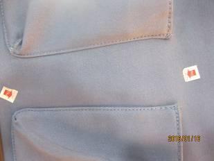 MIN Button or zipper is 0 0 0 unsecured MAJ The varnish on the